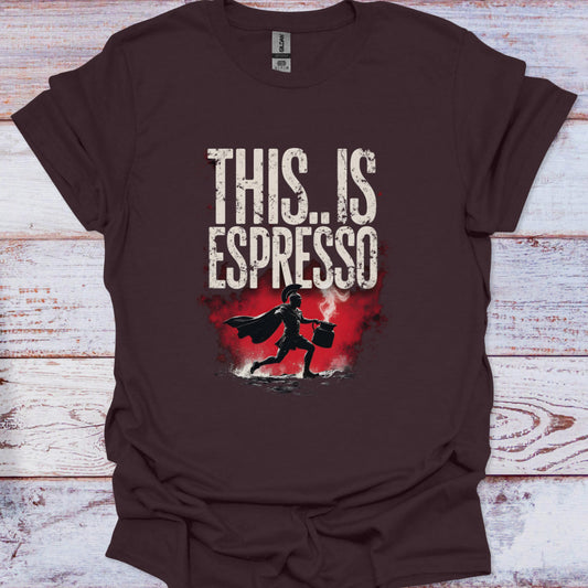 Brown t-shirt with 'THIS.. IS ESPRESSO' text and superhero graphic on a wooden surface