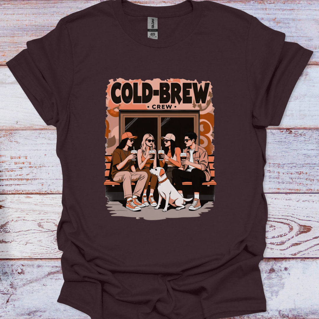Brown t-shirt with 'Cold Brew Crew' graphic on a wooden surface