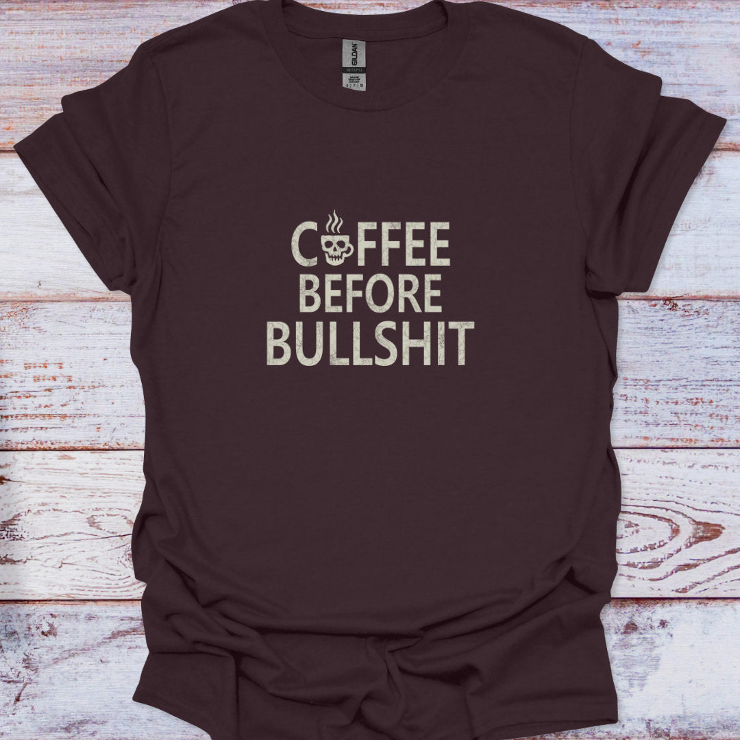 Dark Chocolate t-shirt featuring "Coffee Before Bullshit" distressed text with a skull mug, Funny Sarcastic Quote.