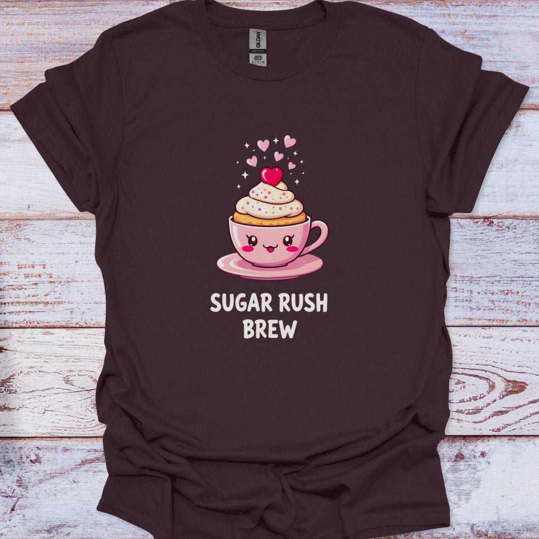 Brown t-shirt with a cartoon coffee cup design and 'Sugar Rush Brew' text on a wooden surface.