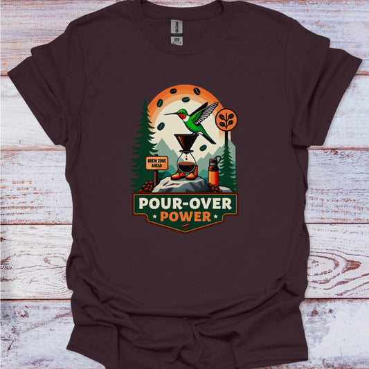Brown t-shirt with 'Pour-Over Power' graphic design on a wooden surface