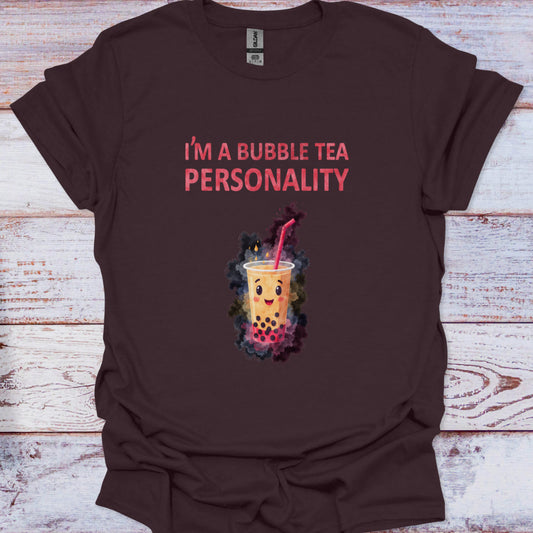Brown t-shirt with bubble tea graphic and text on a wooden surface