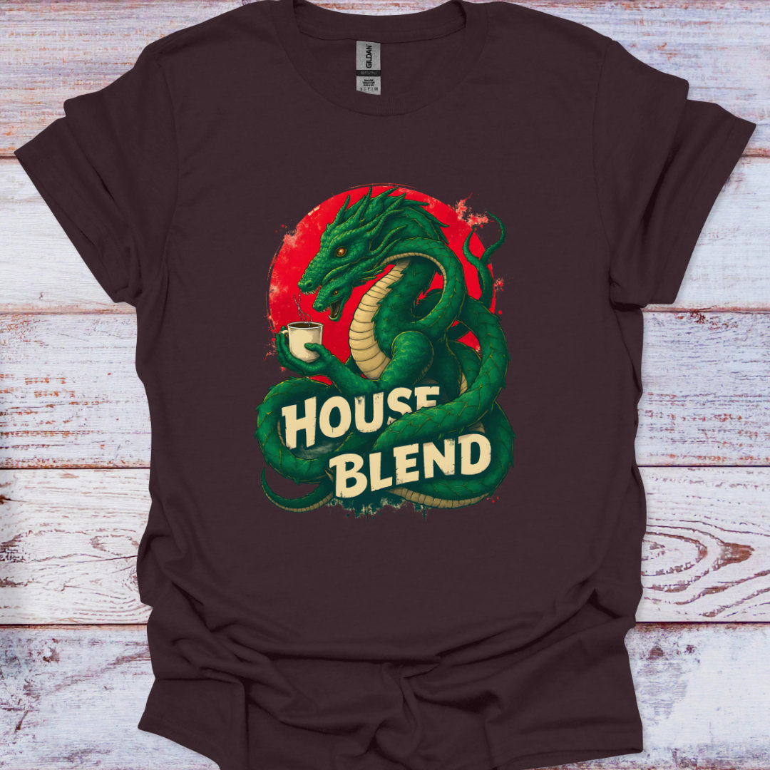 Brown t-shirt with a green snake and 'House Blend' text design on a wooden surface