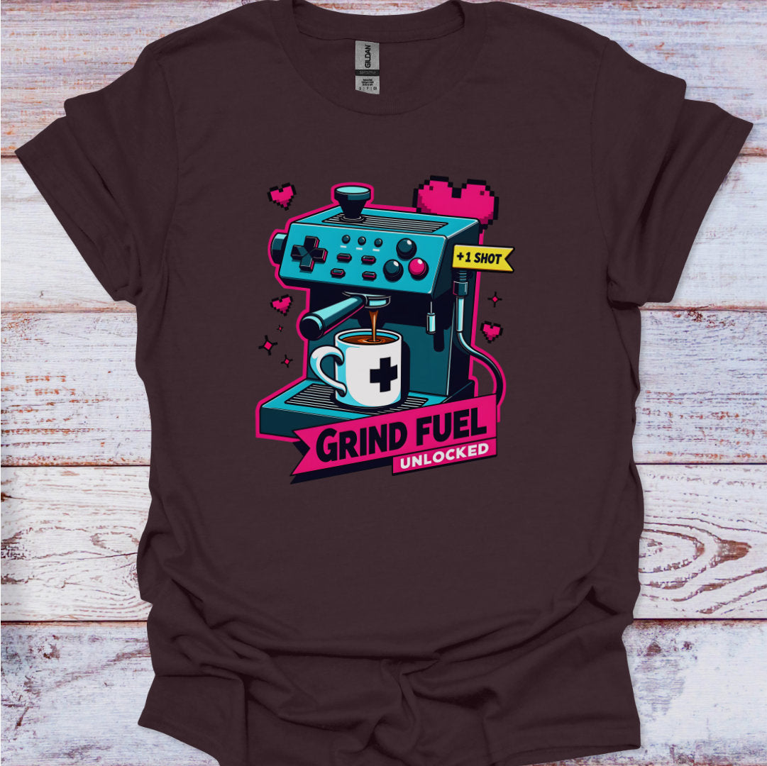 Brown t-shirt with a coffee-themed graphic design on a wooden surface