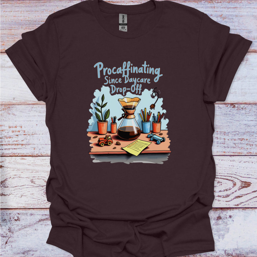 Brown t-shirt with a graphic design and text on a wooden surface