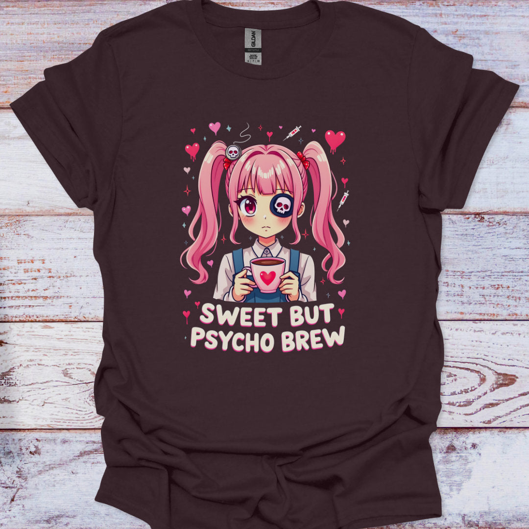 Brown t-shirt with a cartoon character holding a cup and text 'Sweet But Psycho Brew' on a wooden surface.