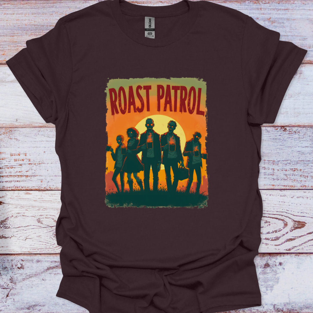 Brown t-shirt with 'Roast Patrol' graphic on a wooden surface
