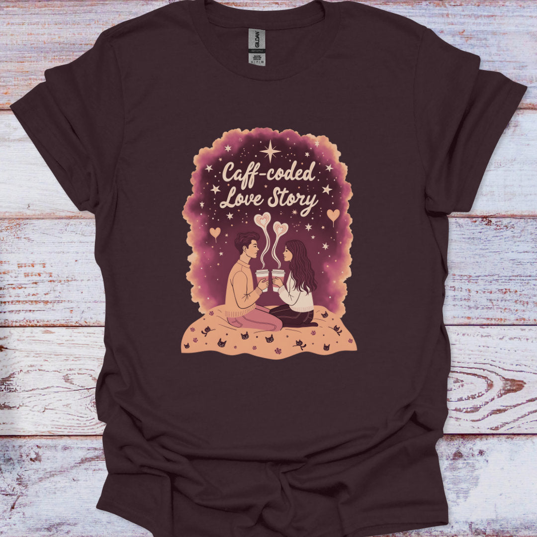Brown t-shirt with 'Caff-coded Love Story' graphic on a wooden surface