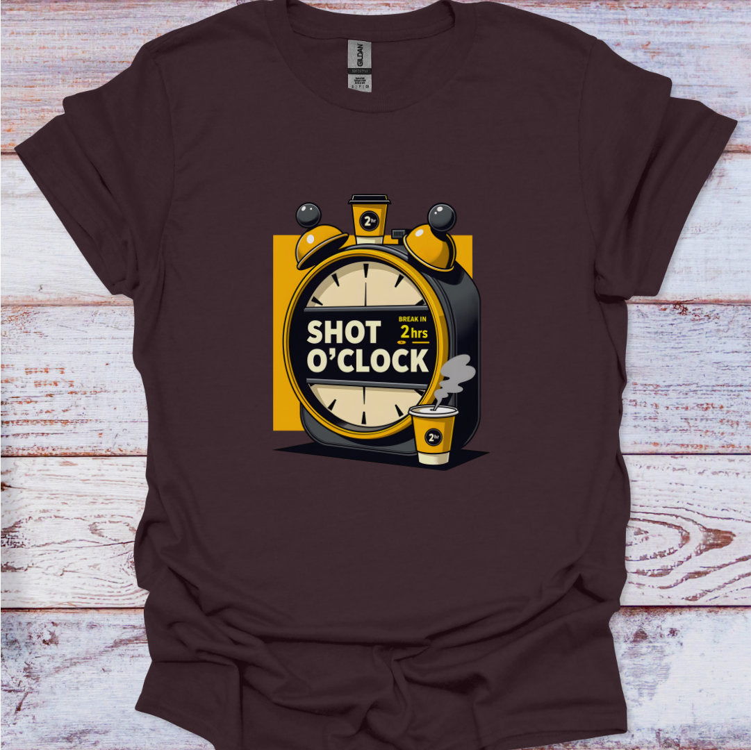 Brown t-shirt with a graphic design of an alarm clock and shot glass on a wooden surface