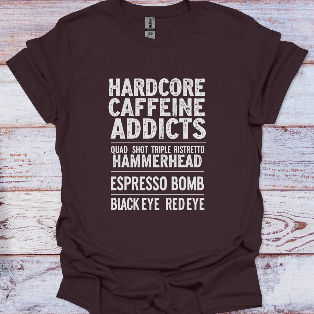Brown t-shirt with white text on a wooden surface
