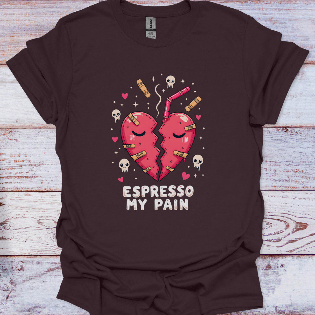 Brown t-shirt with a graphic of two hearts and 'Espresso My Pain' text on a wooden surface