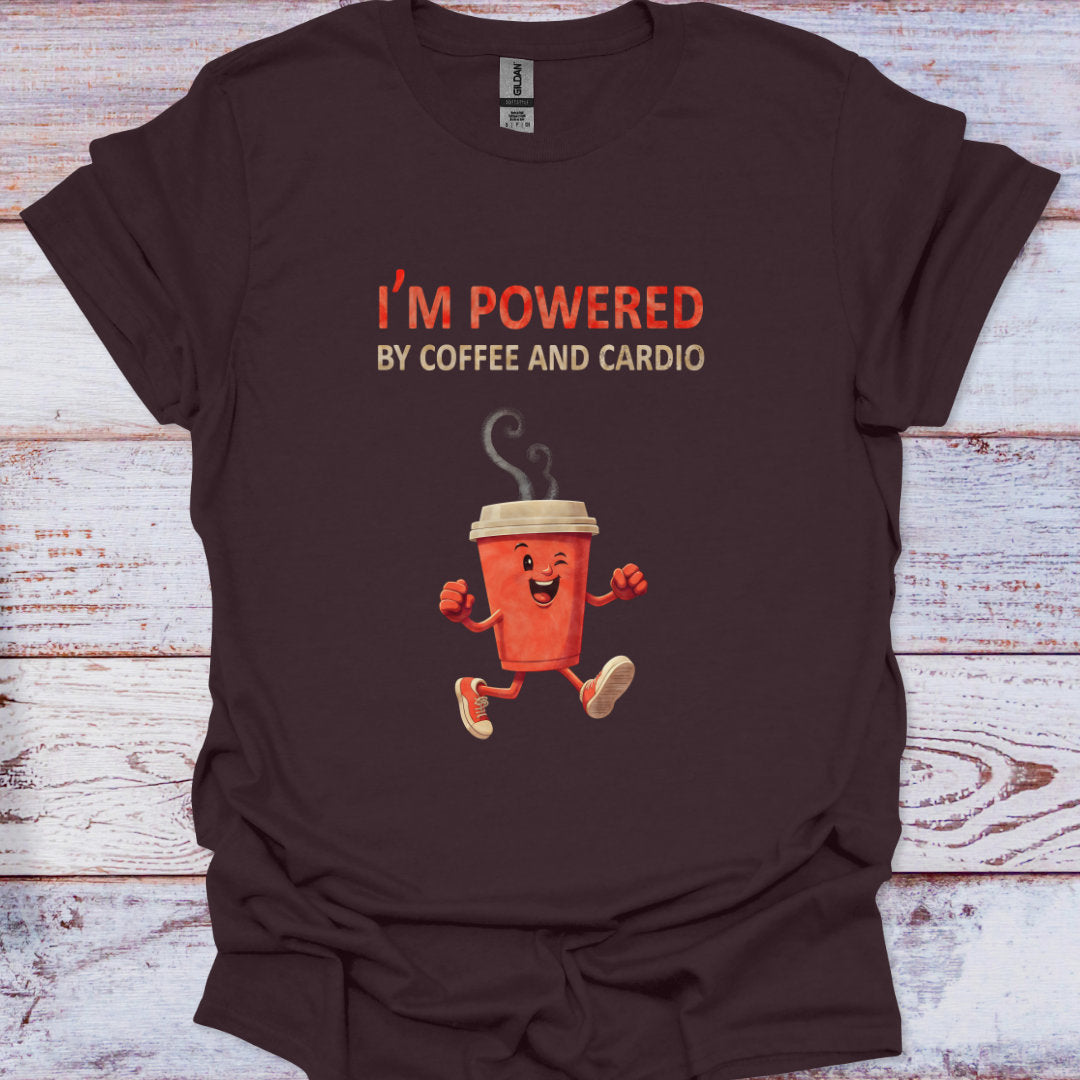 Brown t-shirt with a coffee cup graphic and text 'I'm powered by coffee and cardio' on a wooden surface.