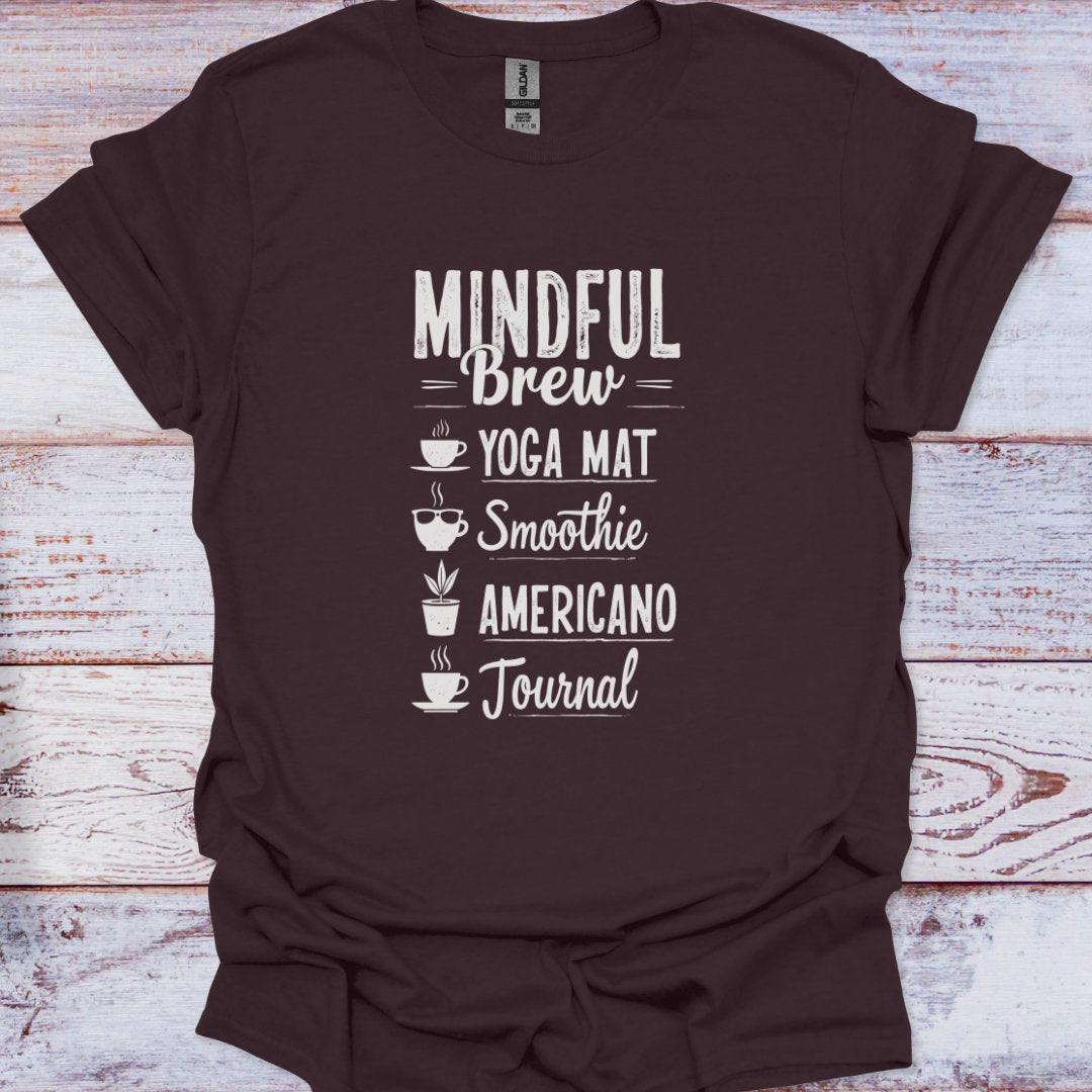 Brown t-shirt with white text on a wooden surface