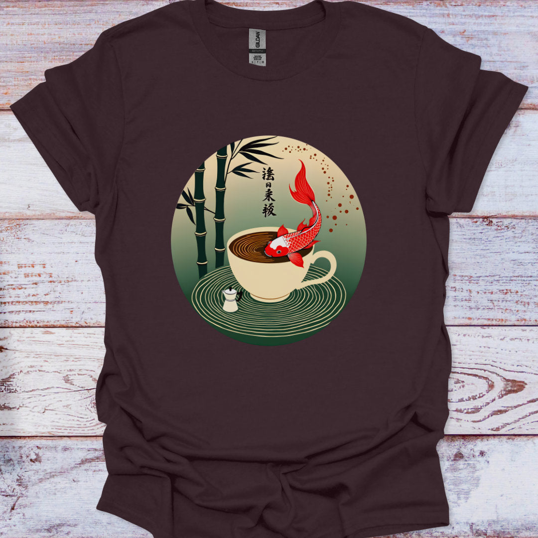 Brown t-shirt with a cup and koi fish design on a wooden surface