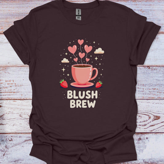 Brown t-shirt with a pink coffee cup graphic and 'Blush Brew' text on a wooden surface