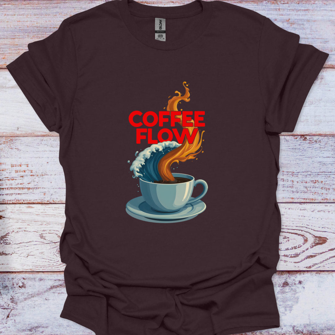 Brown t-shirt with a graphic of a coffee cup and wave, and 'Coffee Flow' text on a wooden surface.