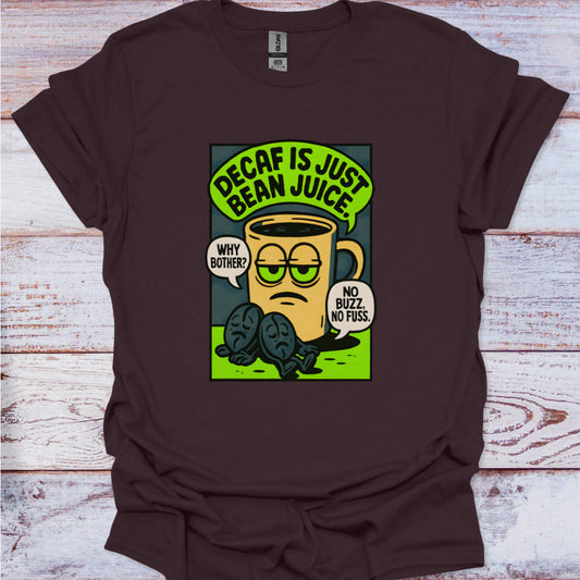 Brown t-shirt with a graphic of a coffee cup and text on a wooden surface