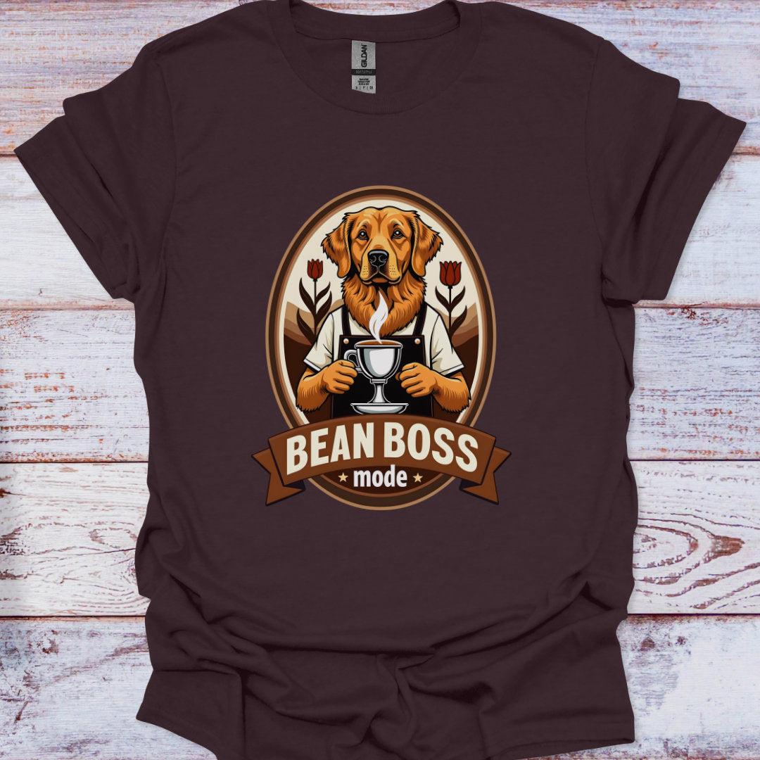 Brown t-shirt with a dog graphic and 'Bean Boss mode' text on a wooden surface