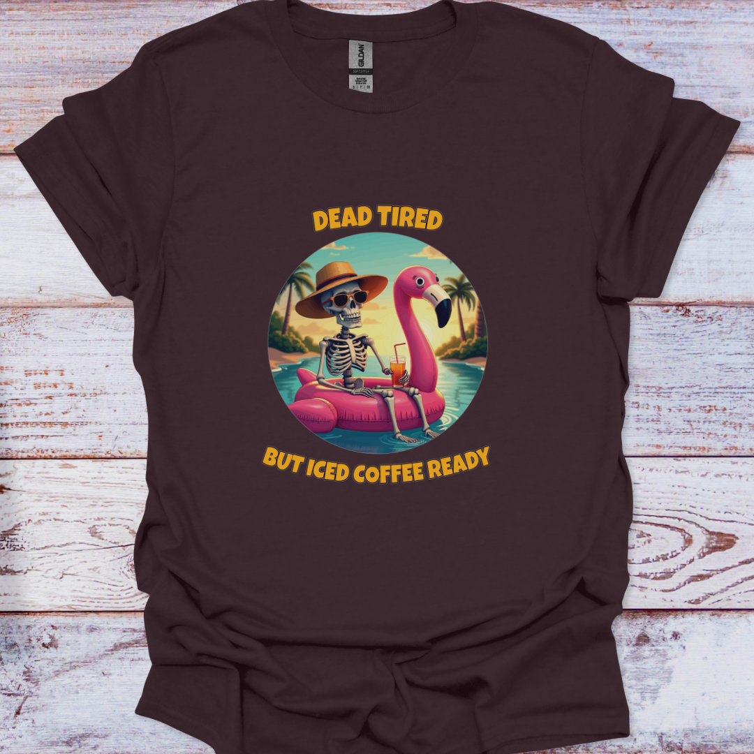 Brown t-shirt with a skeleton and flamingo graphic on a wooden surface