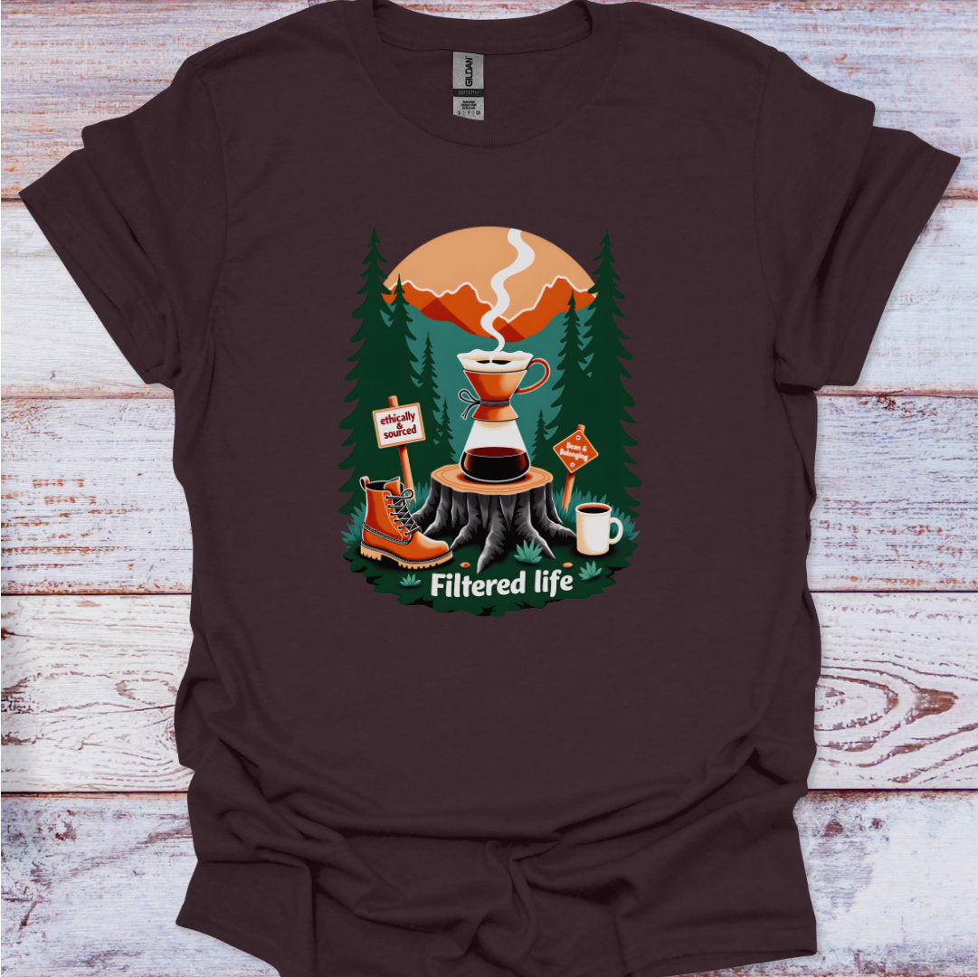 Brown t-shirt with a coffee-themed graphic on a wooden surface