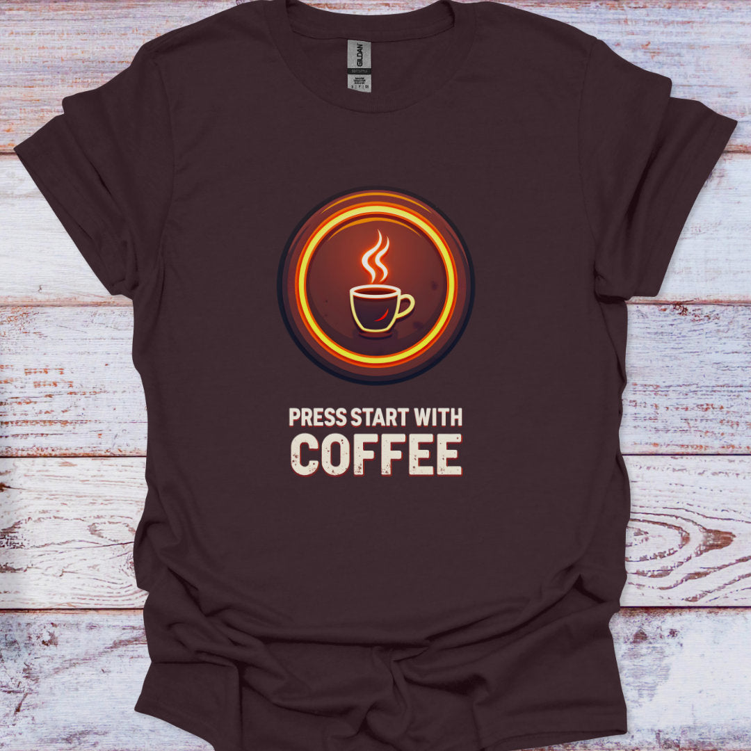 Brown t-shirt with a coffee-themed graphic and text on a wooden surface