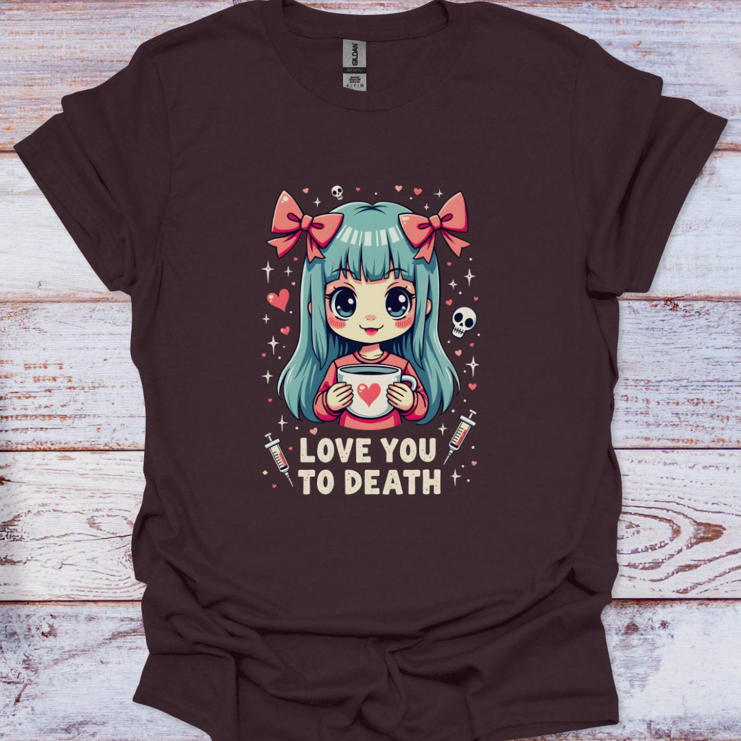 Brown t-shirt with a graphic of a character holding a cup and text 'Love You to Death' on a wooden surface.