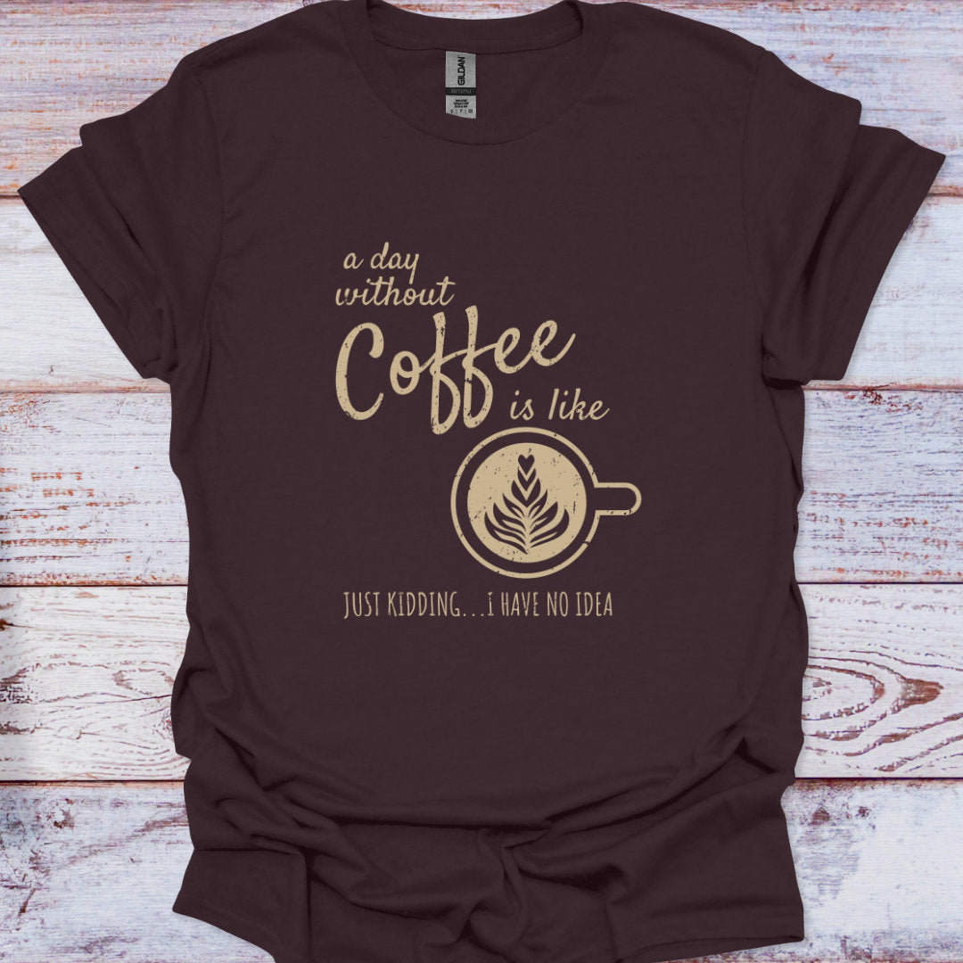 Brown t-shirt with coffee-themed text and graphic on a wooden surface