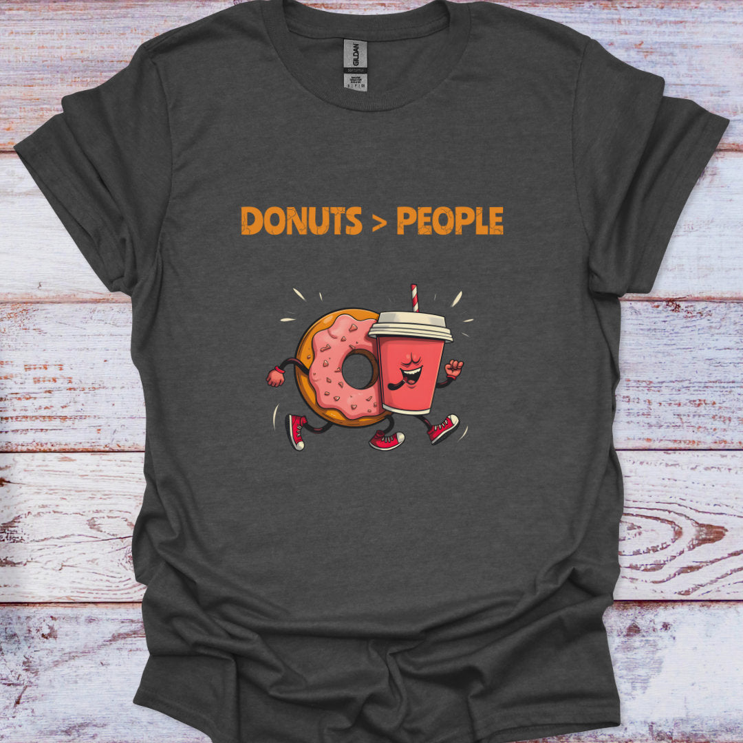 Dark gray t-shirt with a cartoon donut and coffee cup graphic and 'DONUTS > PEOPLE' text on a wooden surface.