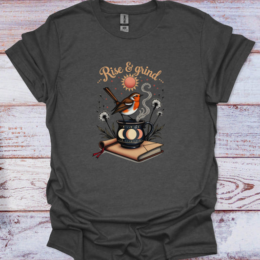 Dark gray t-shirt with a graphic of a bird, coffee cup, and book on a wooden surface