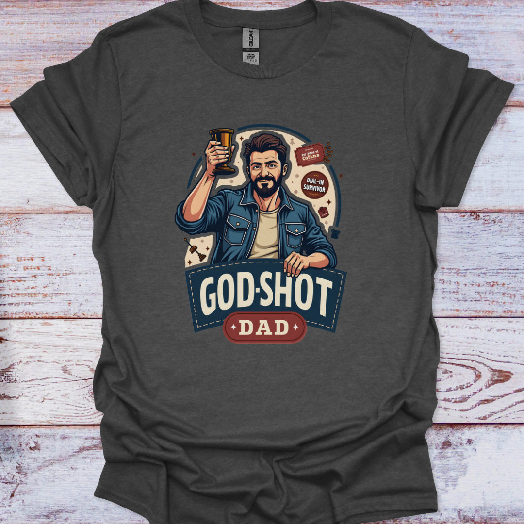 Dark gray t-shirt with a graphic of a man holding a beer and 'God-Shot Dad' text on a wooden surface.