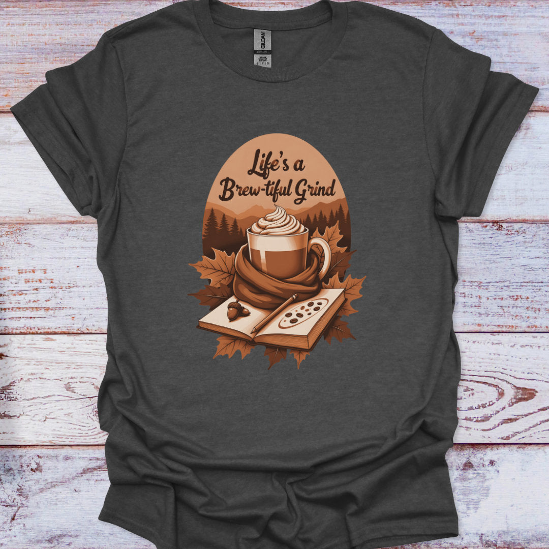 Dark gray t-shirt with a coffee-themed graphic and 'Life's a Brew-tiful Grind' text on a wooden surface.
