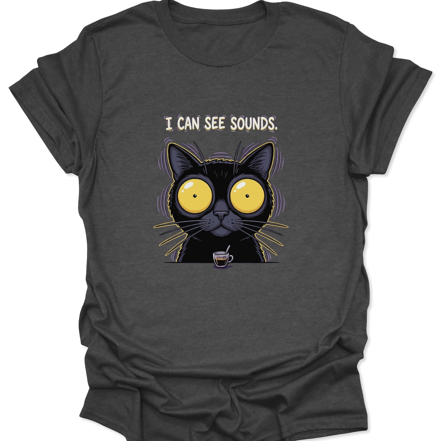 A dark heather gray t-shirt with a high-contrast graphic of a caffeinated black cat and the humorous caption "I CAN SEE SOUNDS" in bold, stylized lettering.