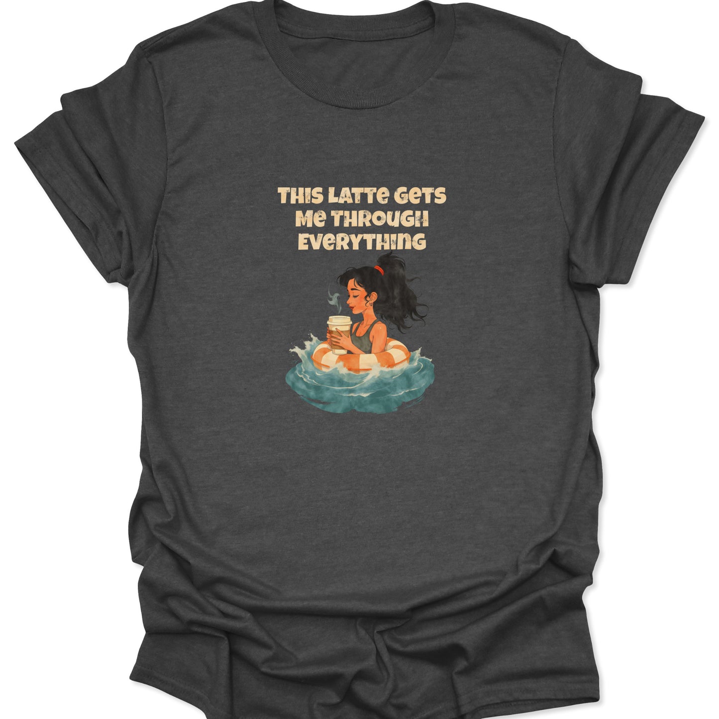 Dark heather gray t-shirt with a cross-niche, existential coffee survival design. Shows a woman in a lifesaver floating, with the text hook: "THIS LATTE GETS ME THROUGH EVERYTHING."