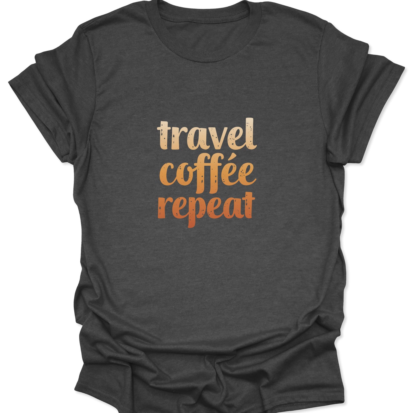 A dark heather gray t-shirt with the retro "travel coffee repeat" graphic, providing a textured, vintage contrast against the warm sunset-colored text.