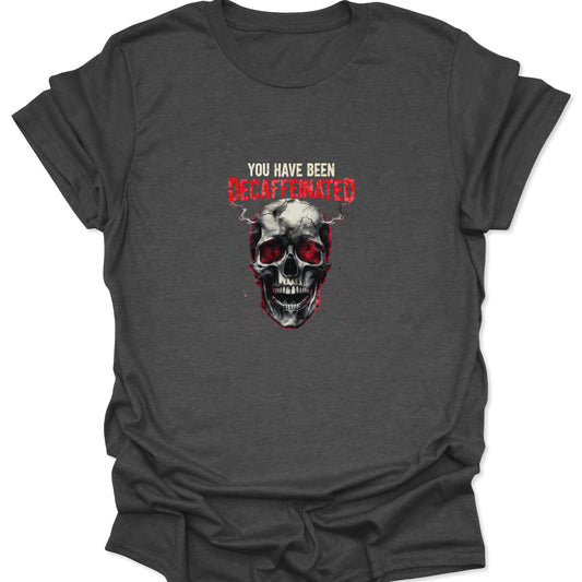 A striking horror-themed graphic centered on the shirt, depicting a skull with a sinister, wide grin, red glowing highlights, and a powerful coffee-related warning text.