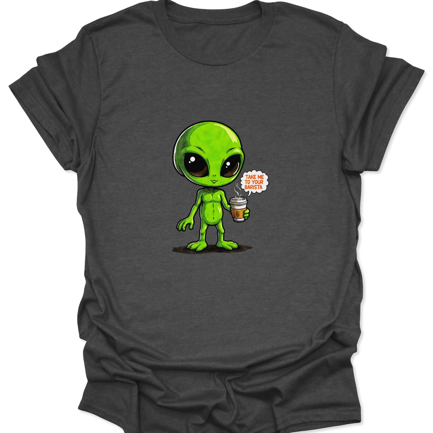 Graphic t-shirt featuring a funny, tiny extraterrestrial demanding caffeine. The vivid green and white graphic stands out clearly against the dark heather gray fabric.