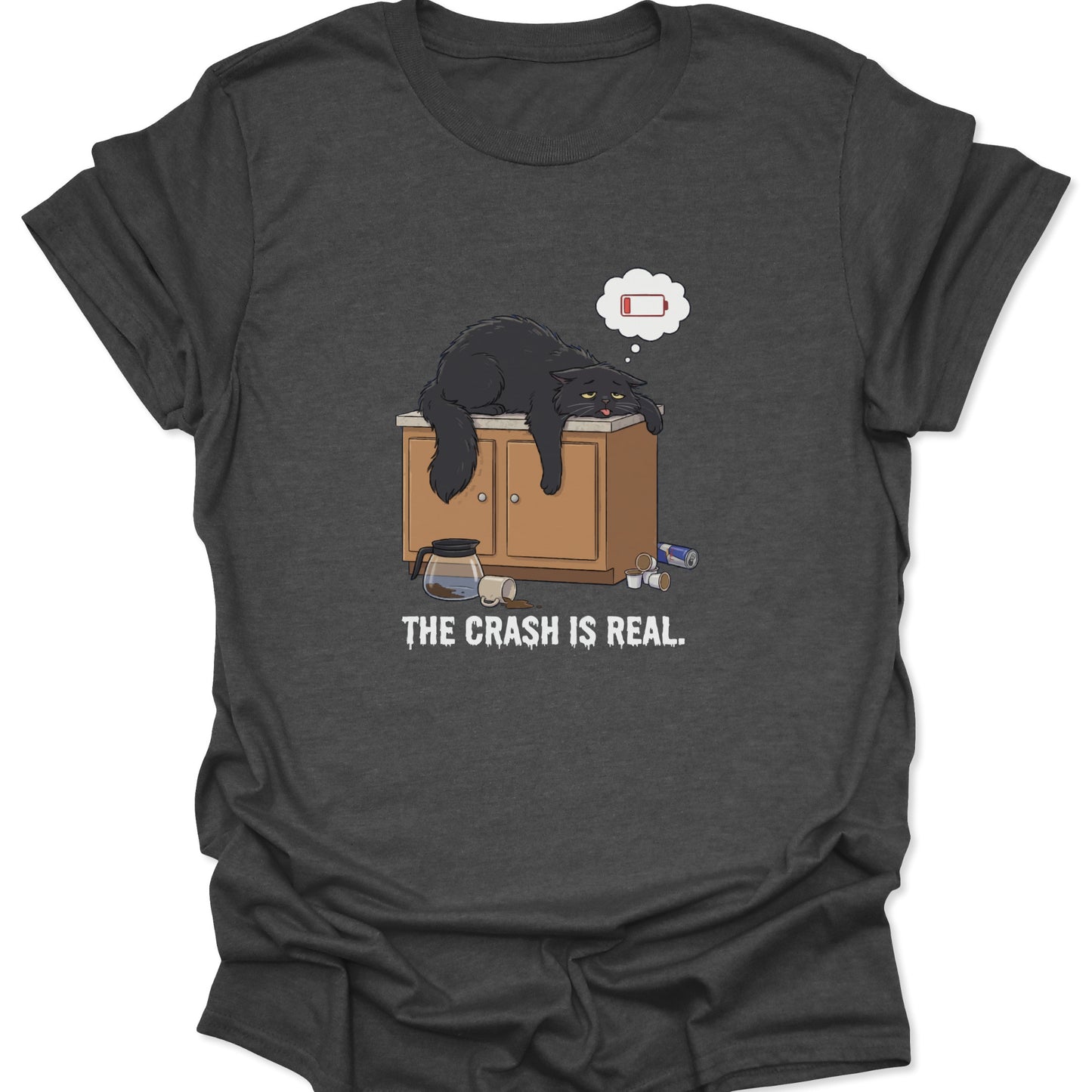 Graphic tee on dark heather gray fabric showing a tired black cat slumped over a counter with a low battery thought bubble.