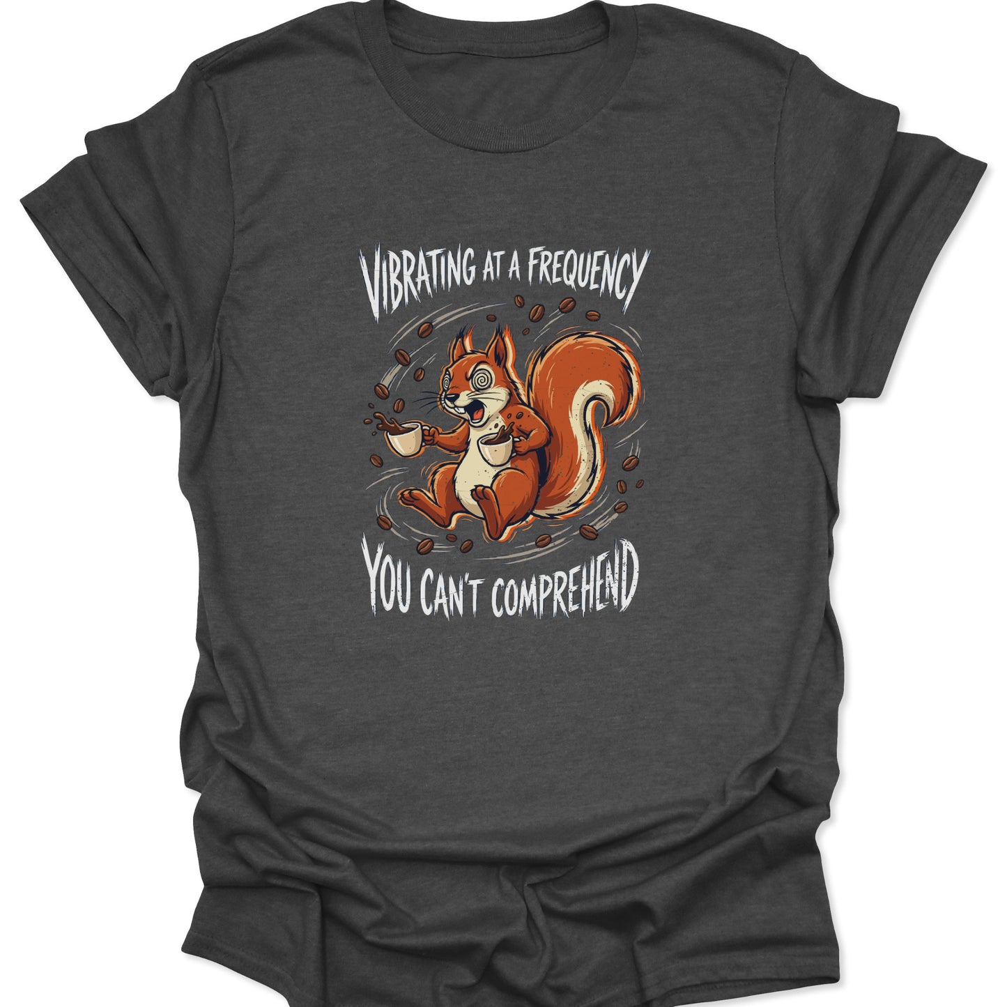 A caffeinated squirrel illustration with a humorous "vibrating frequency" quote centered on a dark heather gray textured t-shirt.
