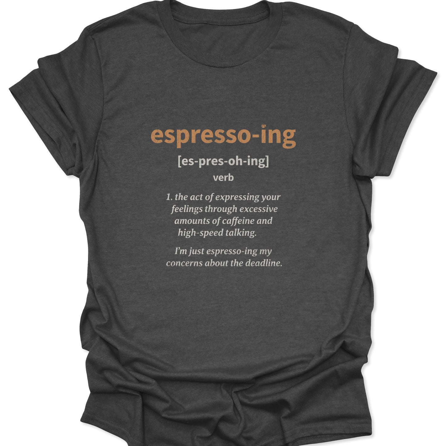 A dark heather gray t-shirt with a vintage-style dictionary entry for "espresso-ing" printed in a textured brown font.