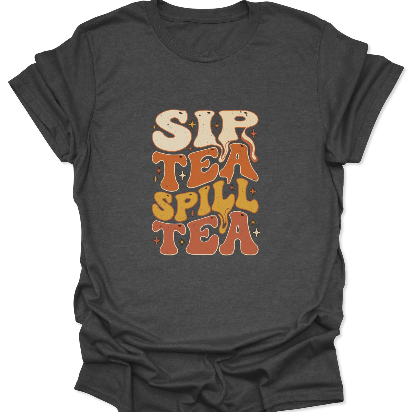 Graphic t-shirt on dark heather gray featuring a wavy, psychedelic "Sip Tea Spill Tea" slogan in high-contrast vintage colors.