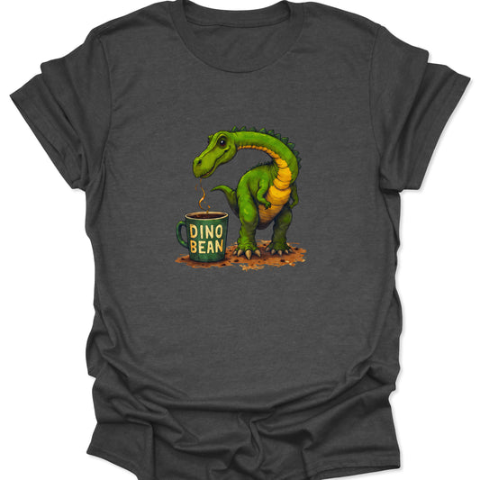 Grinning green dinosaur graphic leaning over a coffee mug with steam, high contrast on a dark heather gray graphic tee.
