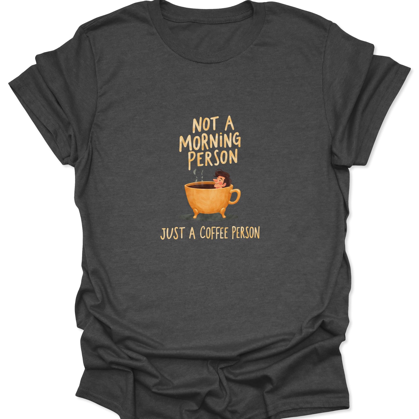 Dark gray shirt featuring the "Coffee Person" graphic; a witty illustration of a figure relaxing in a steaming coffee cup. Ideal for espresso enthusiasts and sleep-deprived adults.
