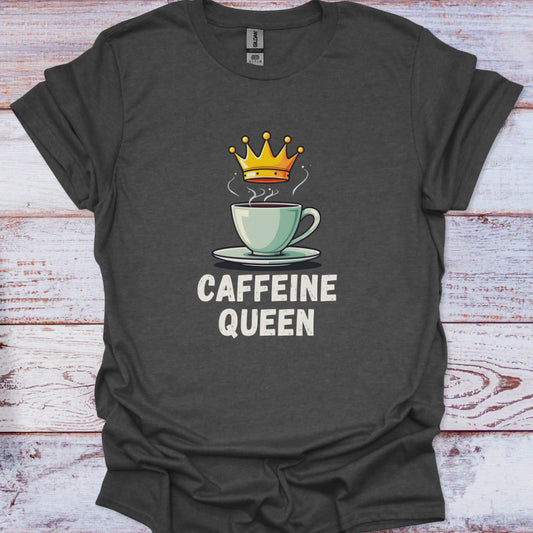 Dark gray t-shirt with a graphic of a coffee cup and crown labeled 'Caffeine Queen' on a wooden surface.