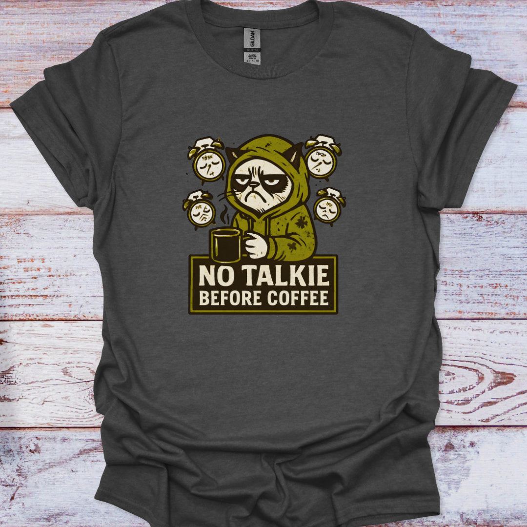 Dark gray t-shirt with a graphic of a character in a coffee-themed design on a wooden surface.