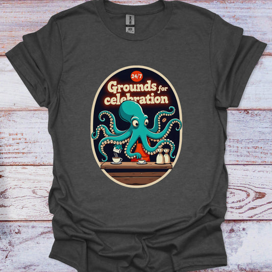 Dark gray t-shirt with a colorful octopus graphic and 'Grounds for celebration' text on a wooden surface.