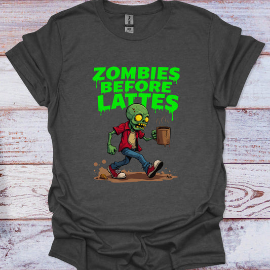 Gray t-shirt with a zombie graphic and 'Zombies Before Lattes' text on a wooden surface