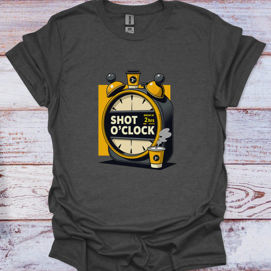 Gray t-shirt with a graphic design of an alarm clock and shot glass on a wooden surface