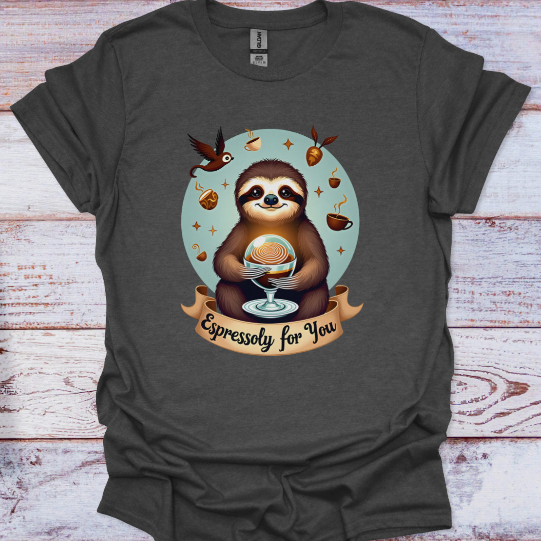 Dark gray t-shirt with a sloth holding a coffee cup graphic and 'Espressoly for You' text on a wooden surface.