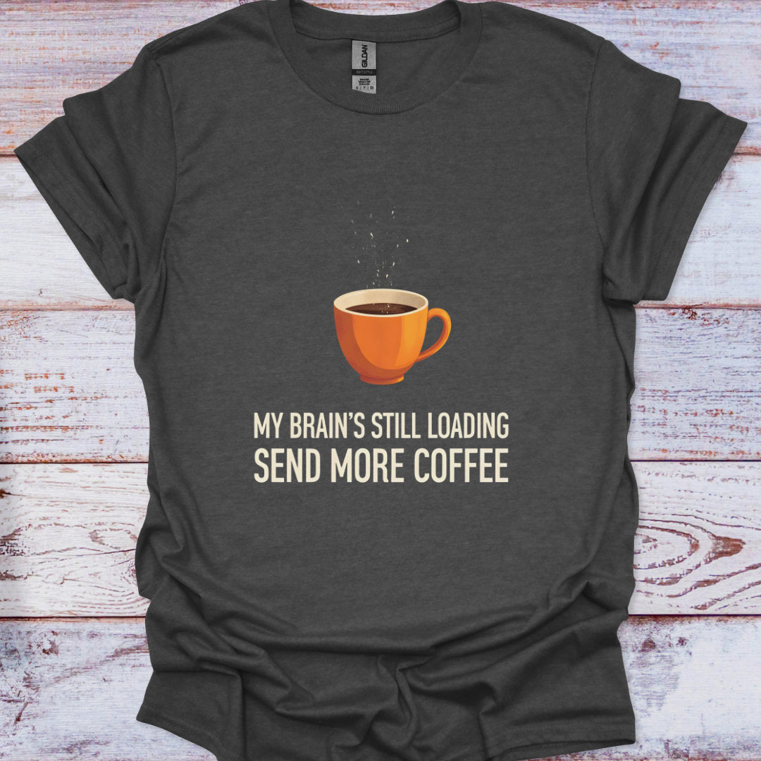 Dark gray t-shirt with a coffee cup graphic and text on a wooden surface