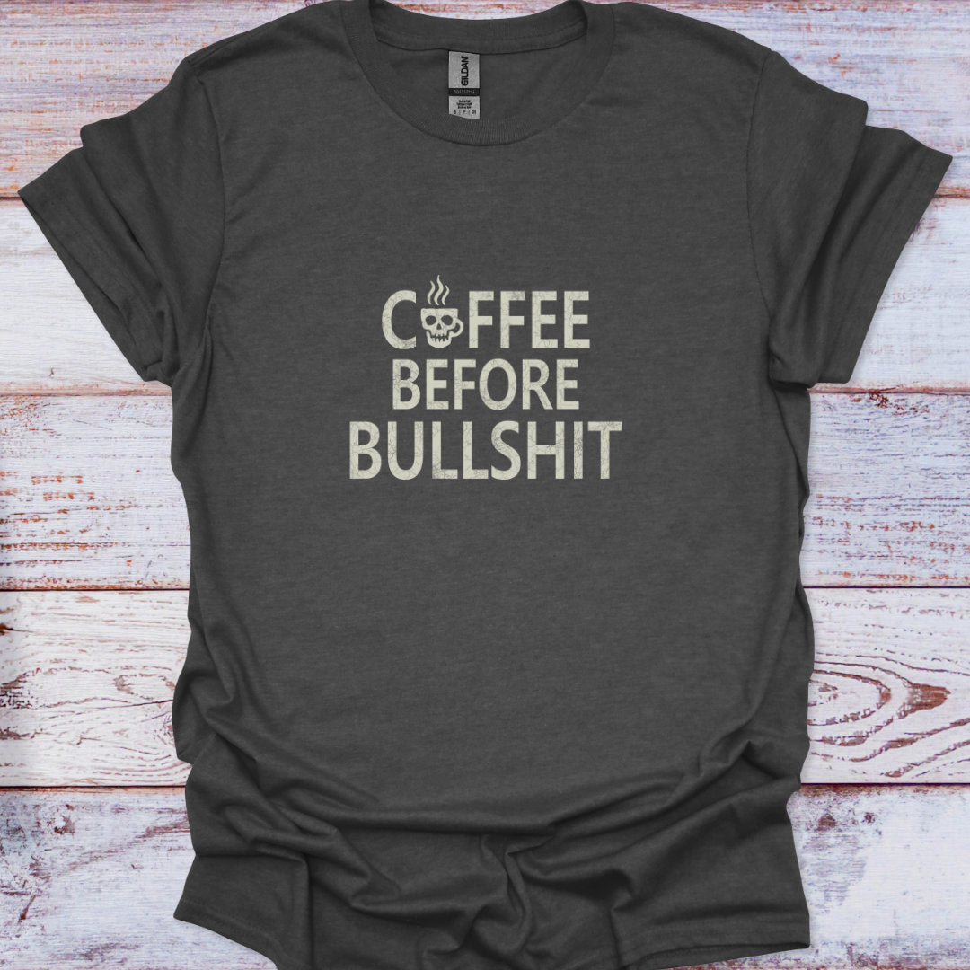 Dark Heather t-shirt featuring "Coffee Before Bullshit" distressed text with a skull mug, Funny Sarcastic Quote.